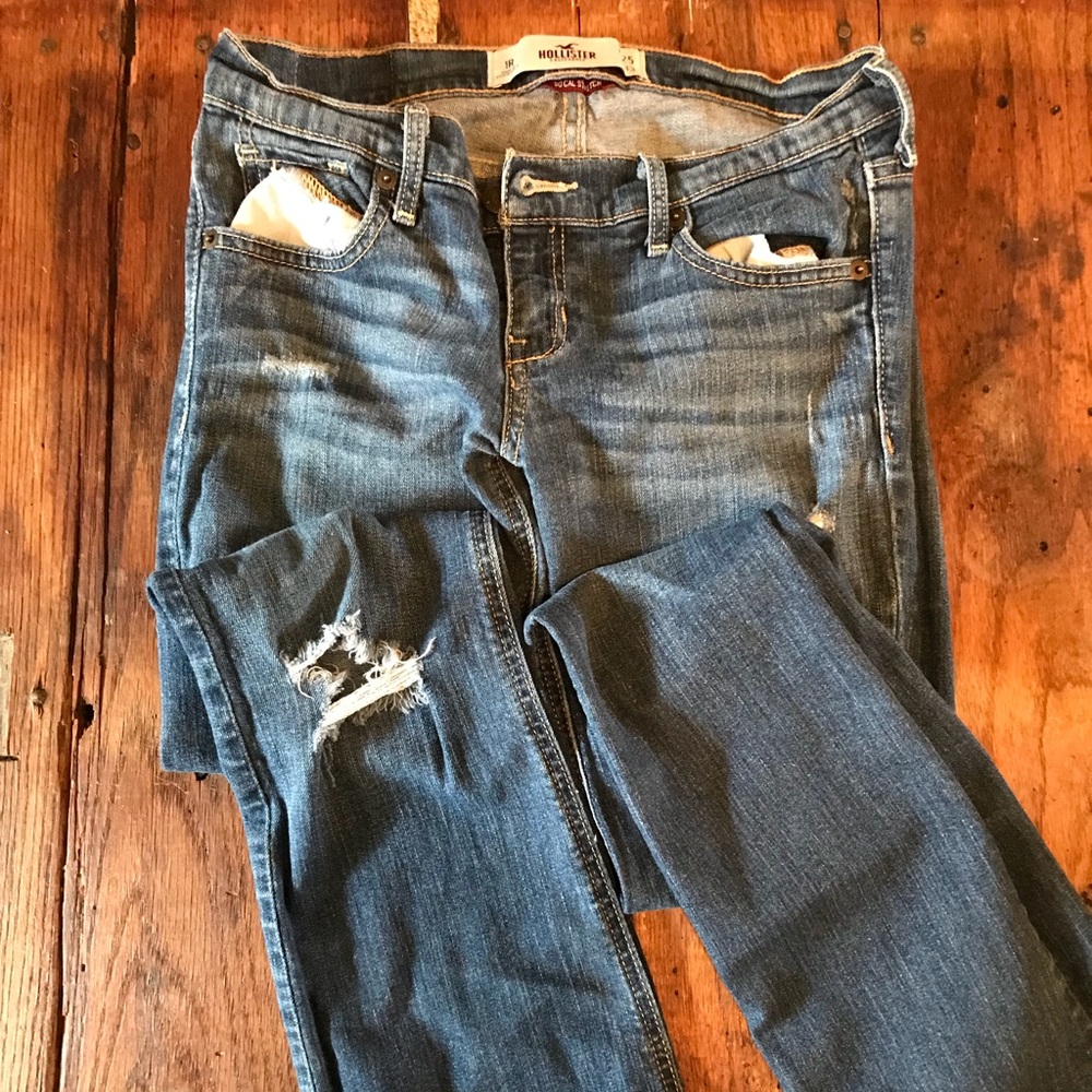 Distressed denim jeans